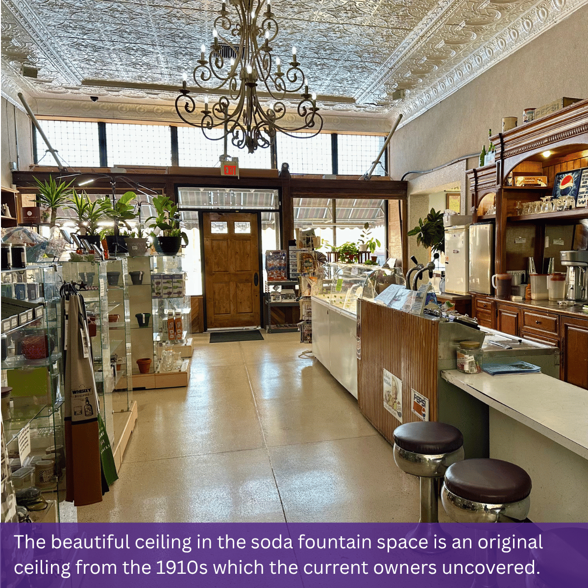 The beautiful ceiling in the soda fountain space is an original ceiling from the 1910s which the current owners uncovered.