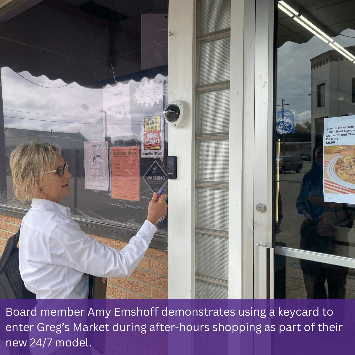 Woman using keycard to enter grocery store with text reading: "Board member Amy Emshoff demonstrates using a keycard to enter Greg's Market during after-hours shopping as part of their new 24/7 model."