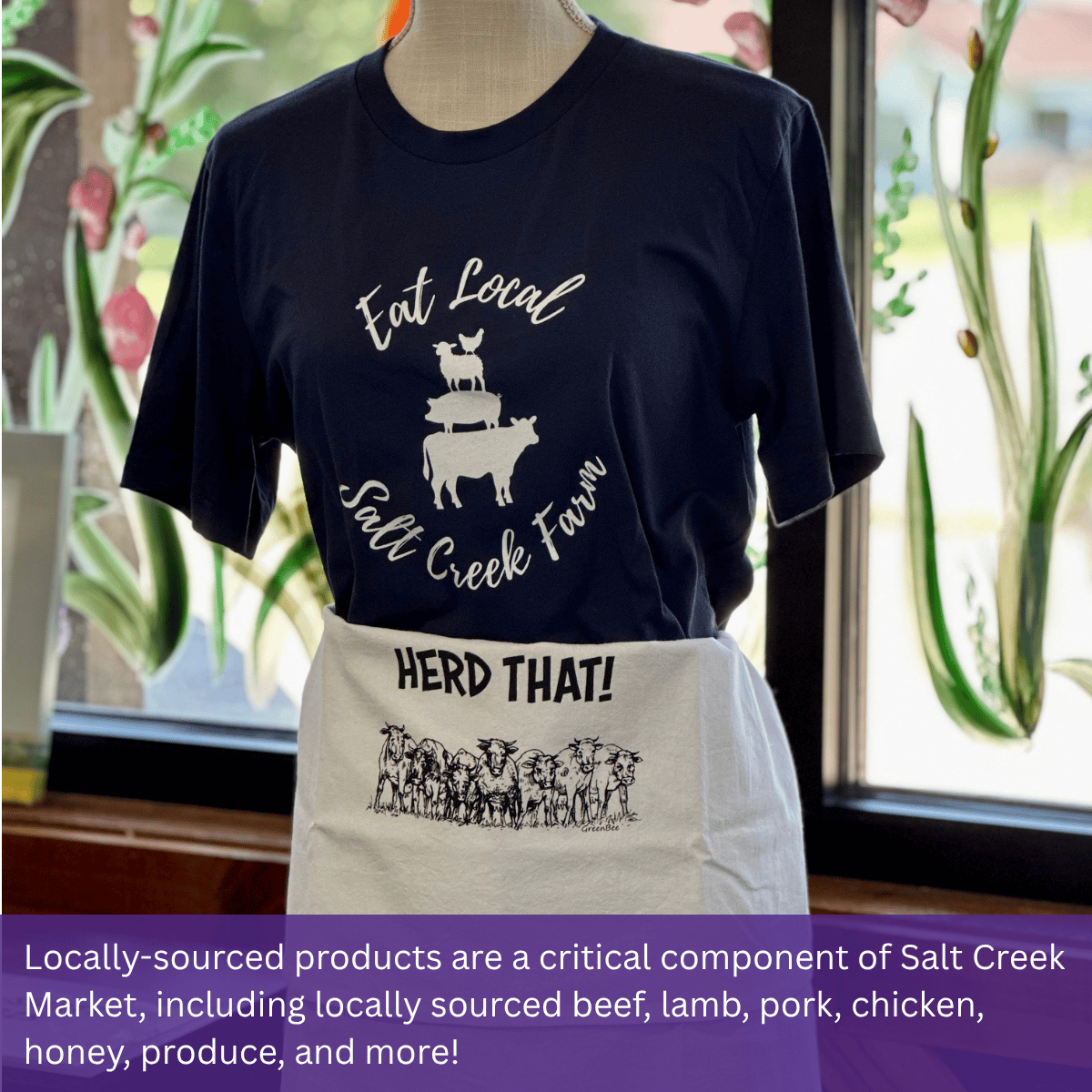 Picture of a mannequin with a shirt reading "Eat Local Salt Creek Farm" and an apron reading "Herd That!"